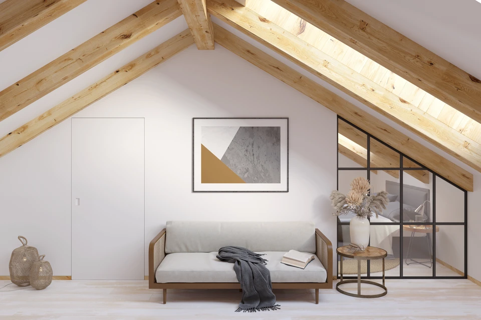 Salle à manger moderne sous combles avec table ronde blanche et chaises design en bois courbé à assises bleues